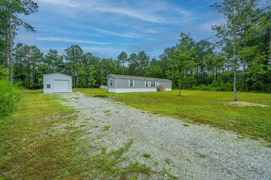 Front exterior of a new home in , Eutawville, SC, highlighting curb appeal (Image 27). Front exterior of a new home in , Eutawville, SC, highlighting curb appeal (Image 27).