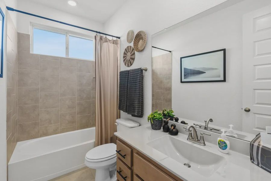 Representative furnished interior of a home built from the Mariah by Chesmar Homes in University Heights, McKinney (Image 40).