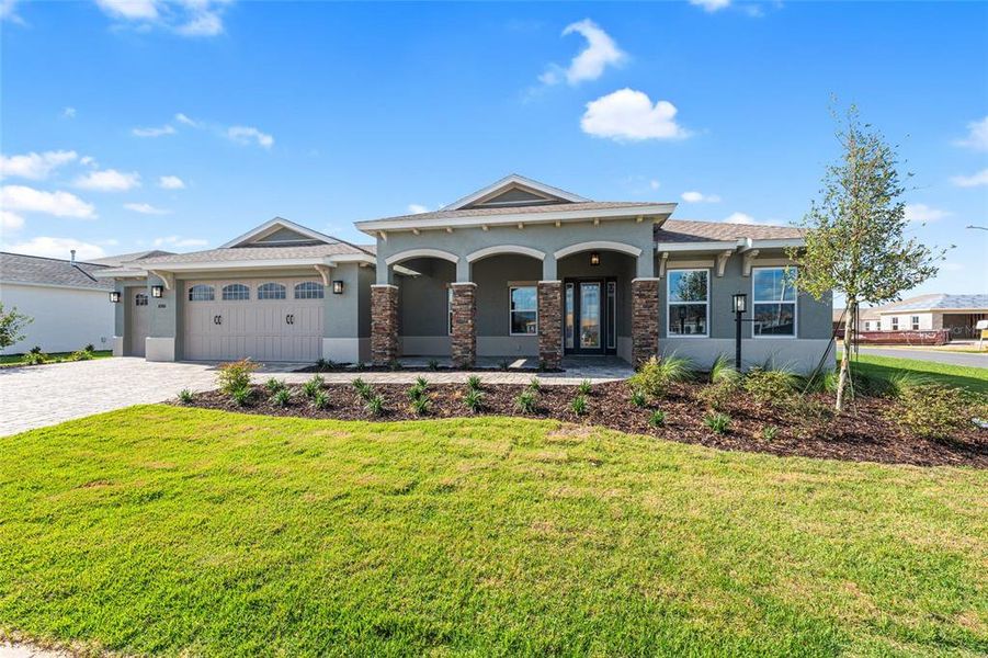 Front exterior of a new home in , Ocala, FL, highlighting curb appeal (Image 30). Front exterior of a new home in , Ocala, FL, highlighting curb appeal (Image 30).