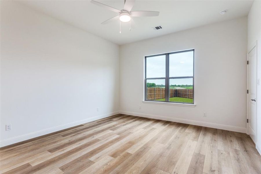 Spacious, unfurnished interior of a new home in Reserves at Trinity, Willow Park (Image 9).
