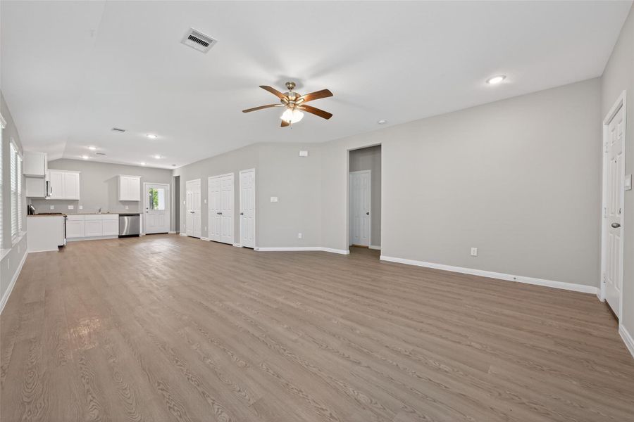 Bright, open concept living room and kitchen.