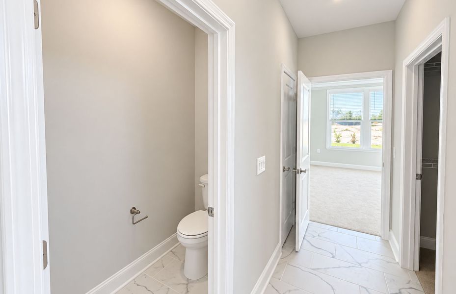 Spacious, unfurnished interior of a new home in Del Webb Wilmington at Mallory Creek, Leland (Image 9).