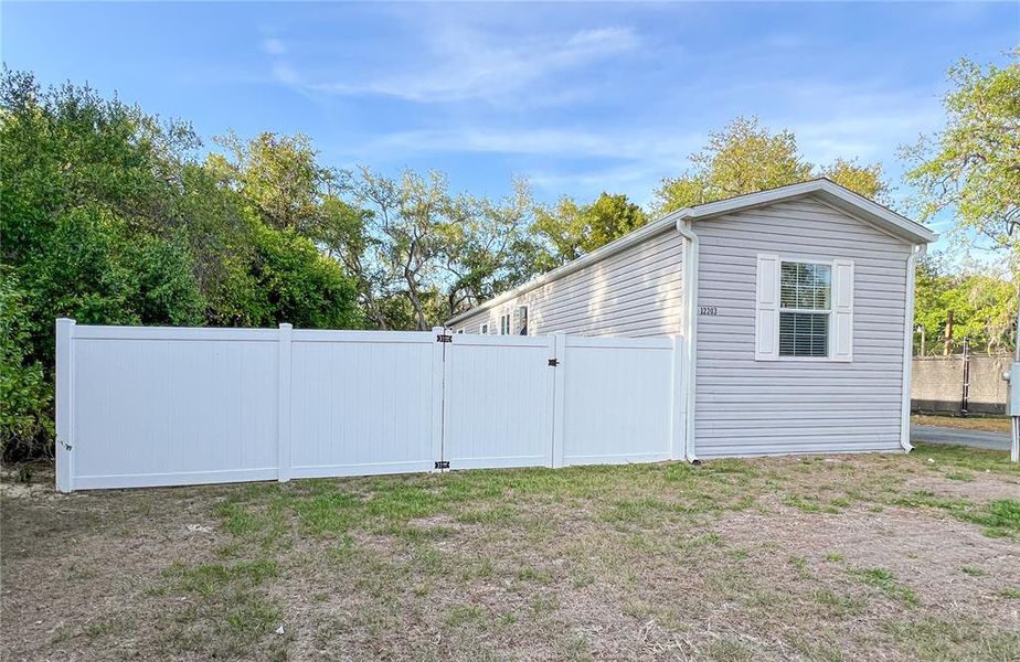 Exterior details and patio area of a home in , New Port Richey (Image 18).
