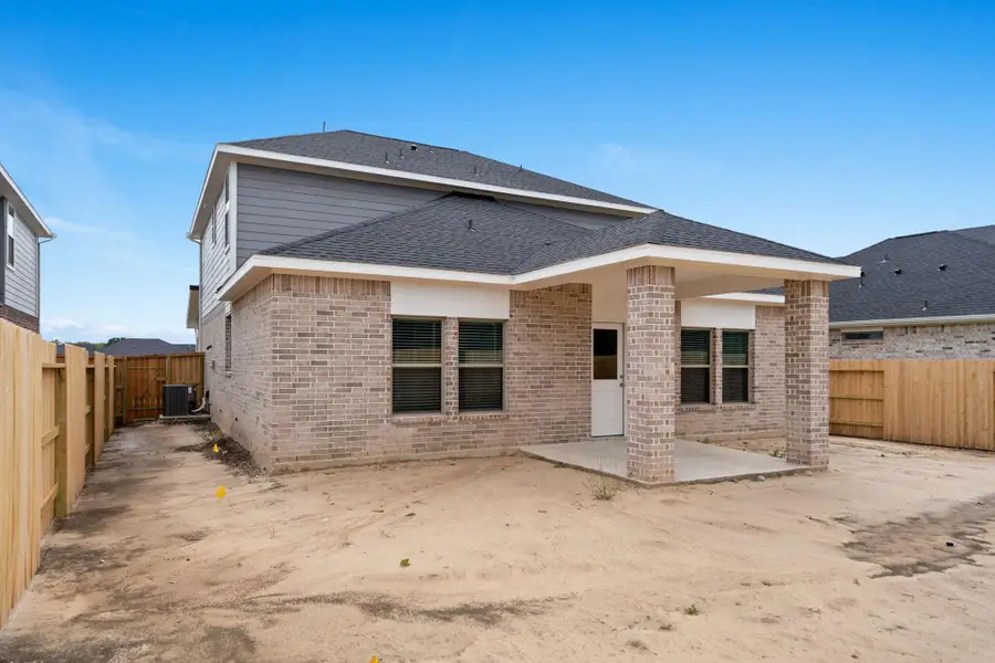 Exterior details and patio area of a home in Laurel Landing, Alvin (Image 4). Exterior details and patio area of a home in Laurel Landing, Alvin (Image 4).