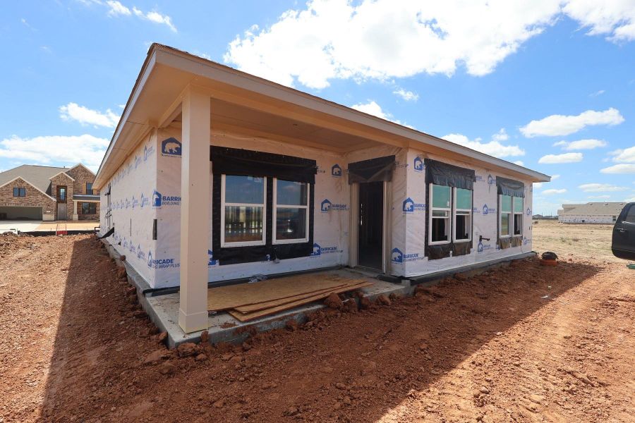 Backyard with covered patio - still under construction!