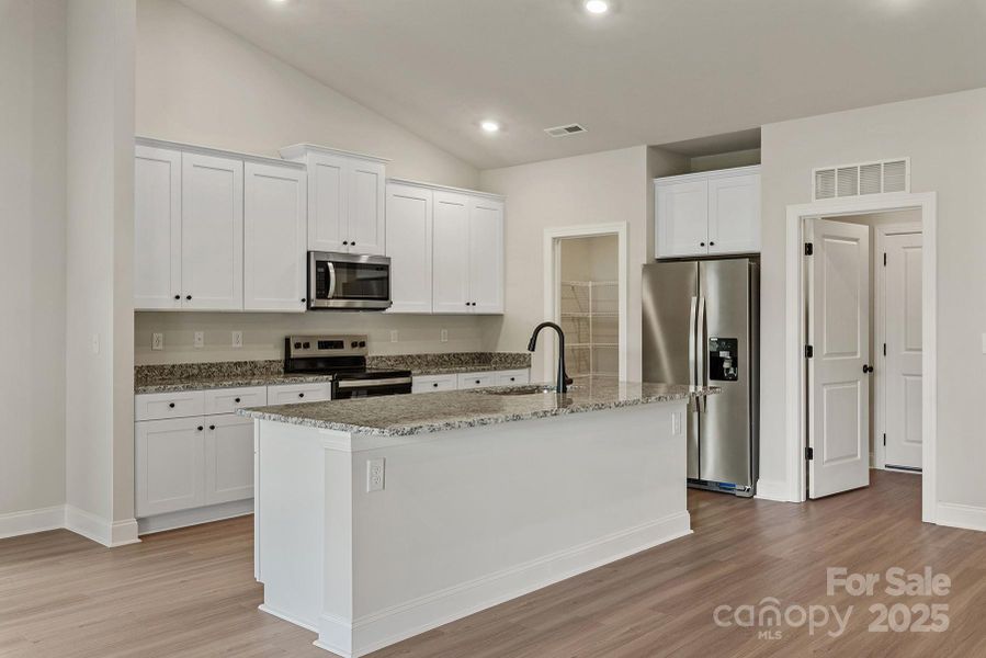 Furnished interior view inside a new home in Ascot Woods, Charlotte (Image 6).