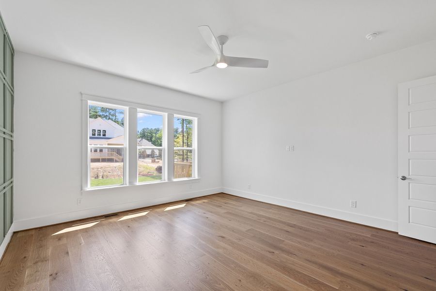 Representative unfurnished interior of a home built from the The Emerson by RobuckHomes in Stonehenge, Raleigh (Image 176).