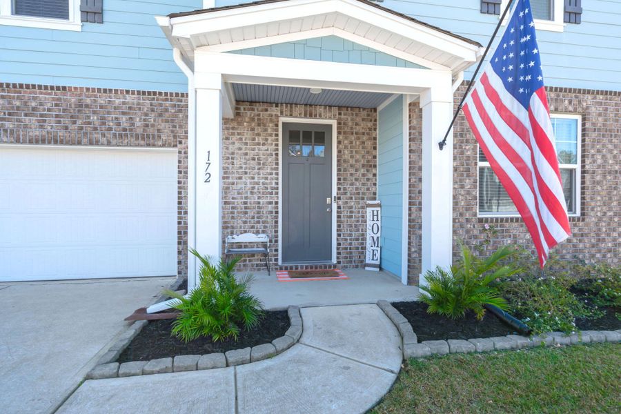 Exterior details and patio area of a home in The Ponds, Summerville (Image 23). Exterior details and patio area of a home in The Ponds, Summerville (Image 23).