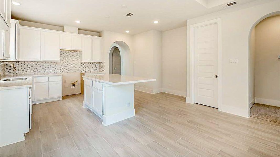 Furnished interior view inside a new home in Grand Central Park, Conroe (Image 7).