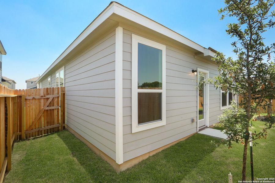 Front exterior of a new home in Fairway Crossing 40s, San Antonio, TX, highlighting curb appeal (Image 21).