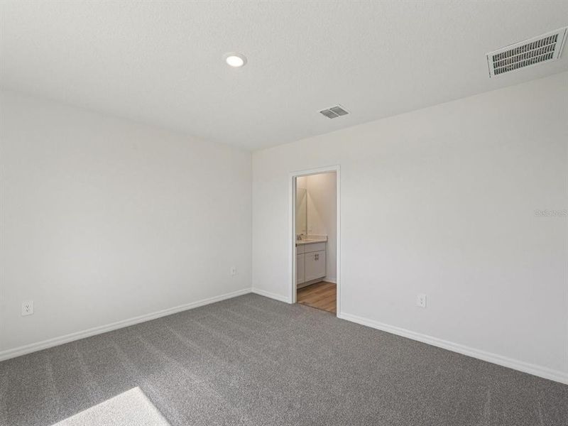Spacious, unfurnished interior of a new home in Magnolia Bay - Premier Series, Nokomis (Image 14).