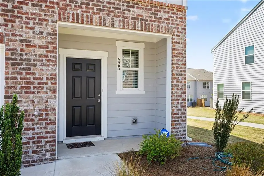 Exterior details and patio area of a home in , Locust Grove (Image 3).