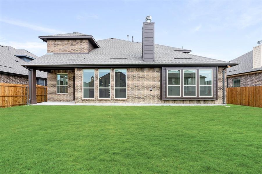 Front exterior of a new home in West Crossing, Anna, TX, highlighting curb appeal (Image 1).