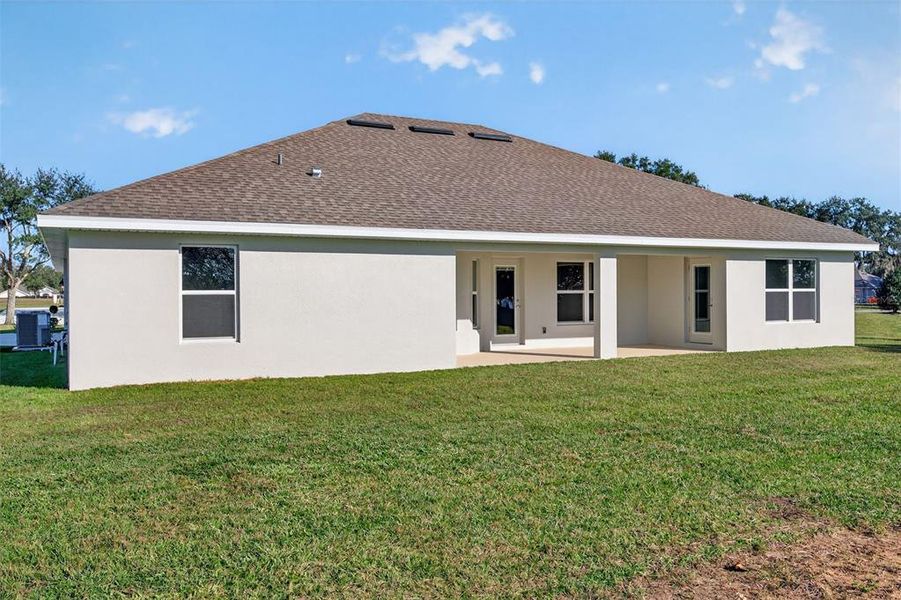Exterior details and patio area of a home in Hill Country Estates, Dade City (Image 33).