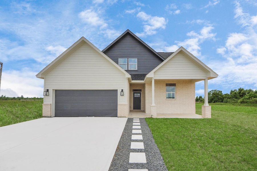 Front exterior of a new home in , Cleveland, TX, highlighting curb appeal (Image 26). Front exterior of a new home in , Cleveland, TX, highlighting curb appeal (Image 26).