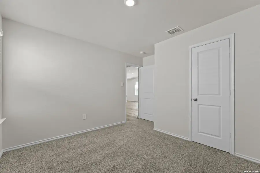 Spacious, unfurnished interior of a new home in Laurel Vistas, San Antonio (Image 14).