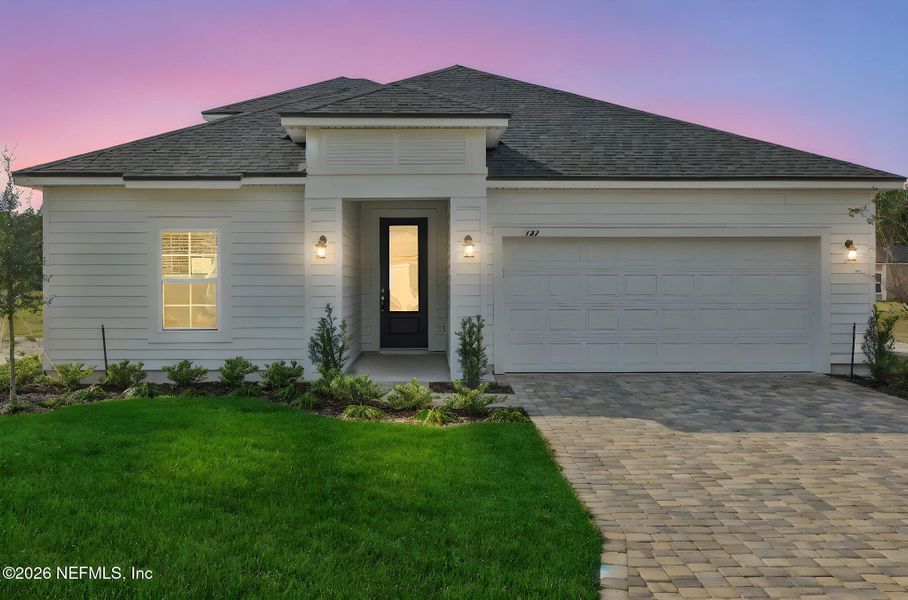 Front exterior of a new home in Brook Forest, St. Augustine, FL, highlighting curb appeal (Image 22).
