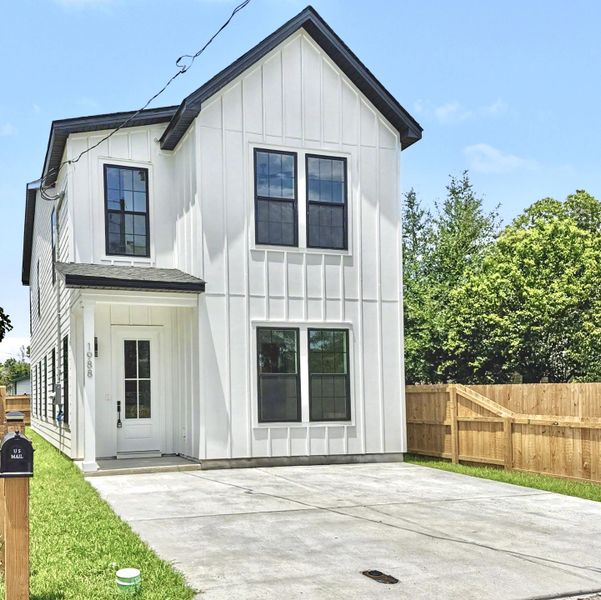 Front exterior of a new home in , North Charleston, SC, highlighting curb appeal (Image 1). Front exterior of a new home in , North Charleston, SC, highlighting curb appeal (Image 1).