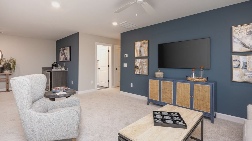 Representative furnished interior of a home built from the Cambridge by Epcon Communities in The Courtyards at Oak Grove, Durham (Image 31).