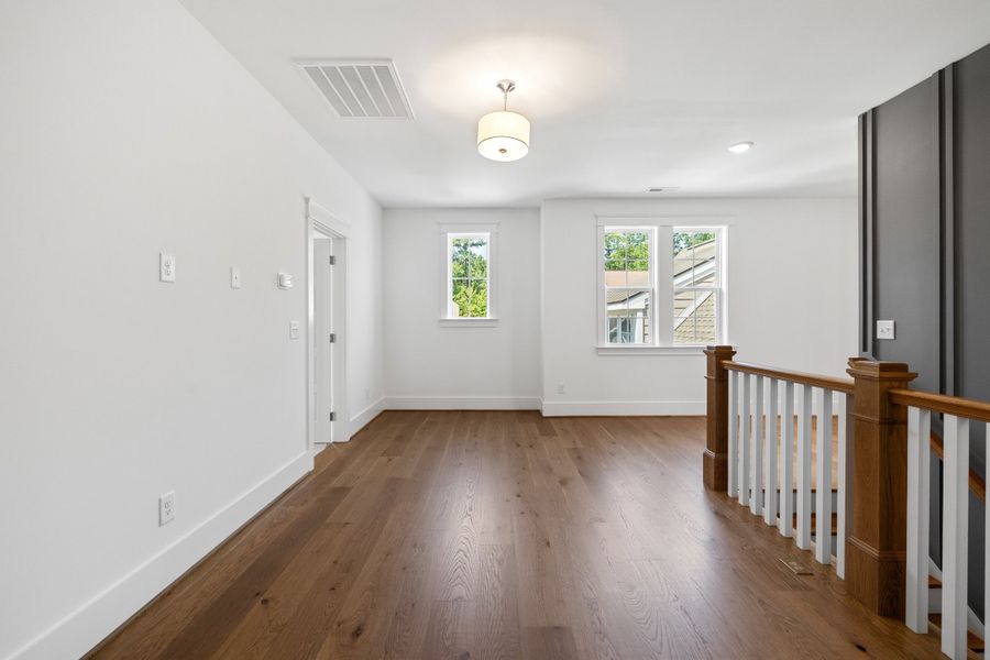 Representative unfurnished interior of a home built from the The Emerson by RobuckHomes in Stonehenge, Raleigh (Image 196).