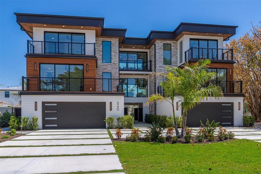 Front exterior of a new home in , Sarasota, FL, highlighting curb appeal (Image 25).