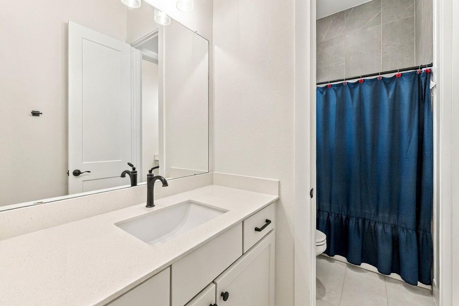 Furnished interior view inside a new home in , Conroe (Image 36).