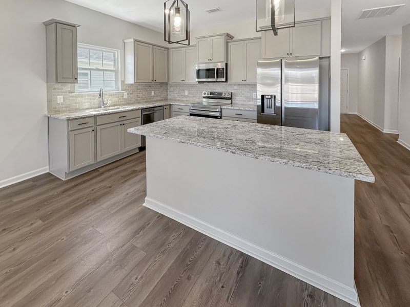 Furnished interior view inside a new home in Grand Reserve, Ludowici (Image 8).