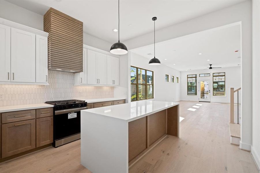 Here's a peak at your kitchen. Previous home by builder. Finishes may vary.