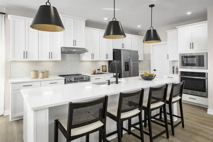 Representative furnished interior of a home built from the Greenwood by Ryan Homes in Windsor Estates, Walhalla (Image 3).