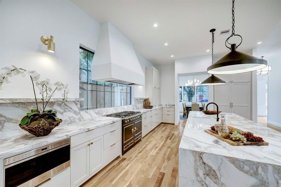 Expansive kitchen including La Cornue gourmet gas range,Wolf/Sub Zero appliances, coffee bar & large pantry