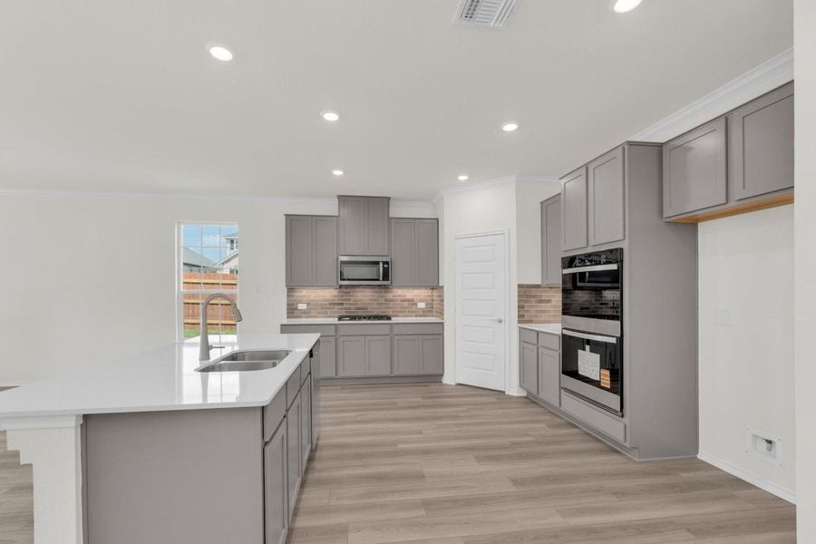 Furnished interior view inside a new home in Salerno - Classic Collection, Round Rock (Image 4).