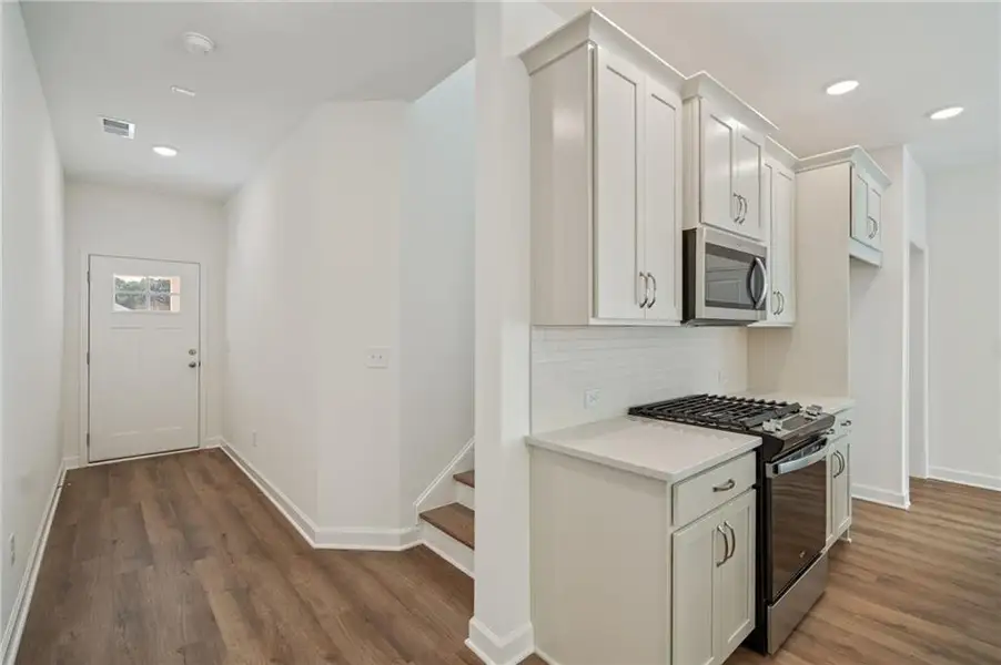 Furnished interior view inside a new home in Bluffs at Bells Ferry, Marietta (Image 2). Furnished interior view inside a new home in Bluffs at Bells Ferry, Marietta (Image 2).