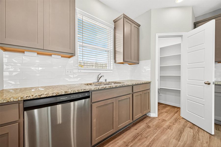 Furnished interior view inside a new home in Sunterra, Katy (Image 13).