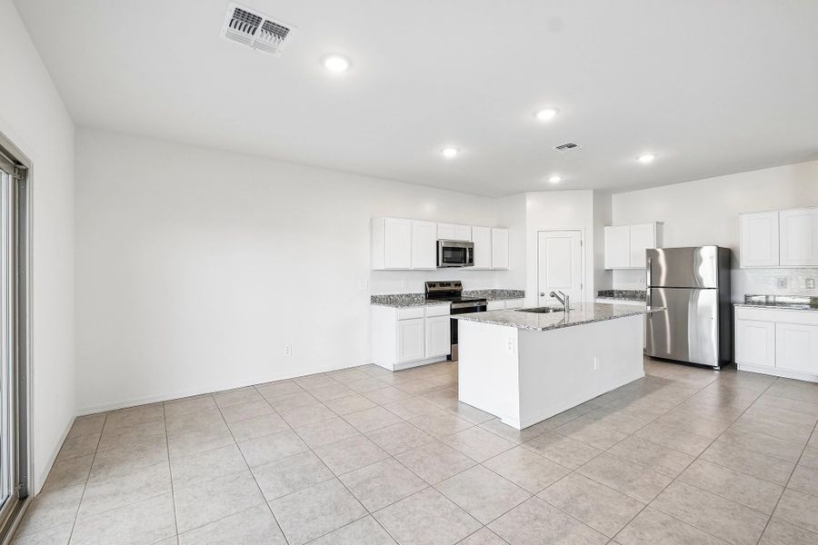 Representative furnished interior of a home built from the Eclipse by Starlight Homes in Laveen Farms, Phoenix (Image 4).
