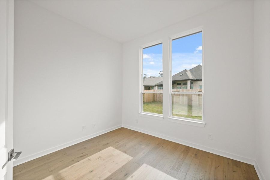 Spacious, unfurnished interior of a new home in Grand Central Park: 55ft. lots, Conroe (Image 19).