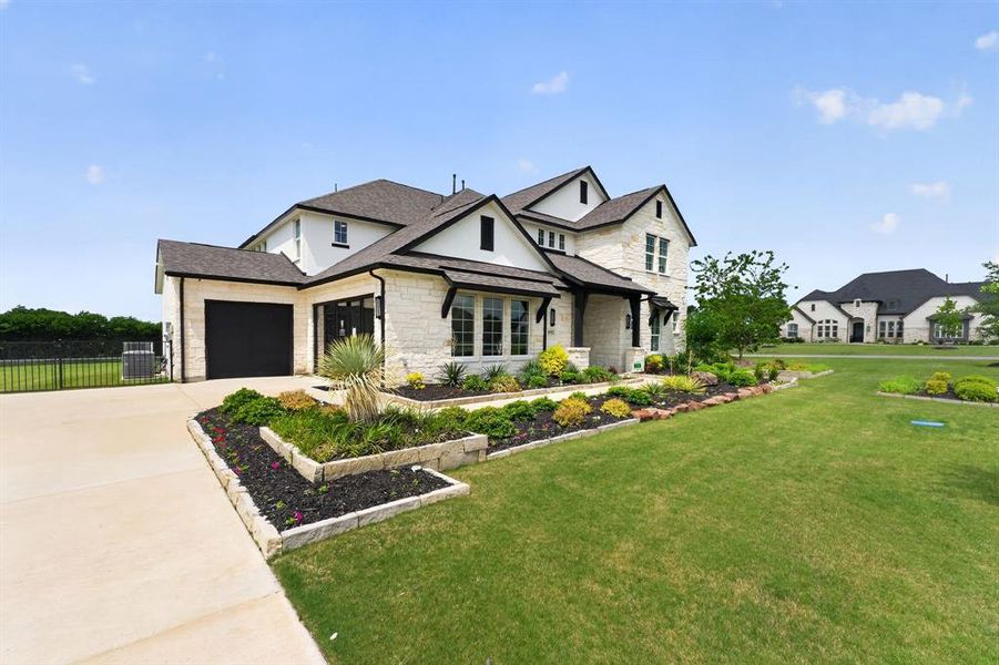 Front exterior of a new home in Highland Crossing, Celina, TX, highlighting curb appeal (Image 1). Front exterior of a new home in Highland Crossing, Celina, TX, highlighting curb appeal (Image 1).