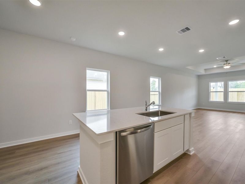 Furnished interior view inside a new home in Caney Creek Place, Conroe (Image 11).