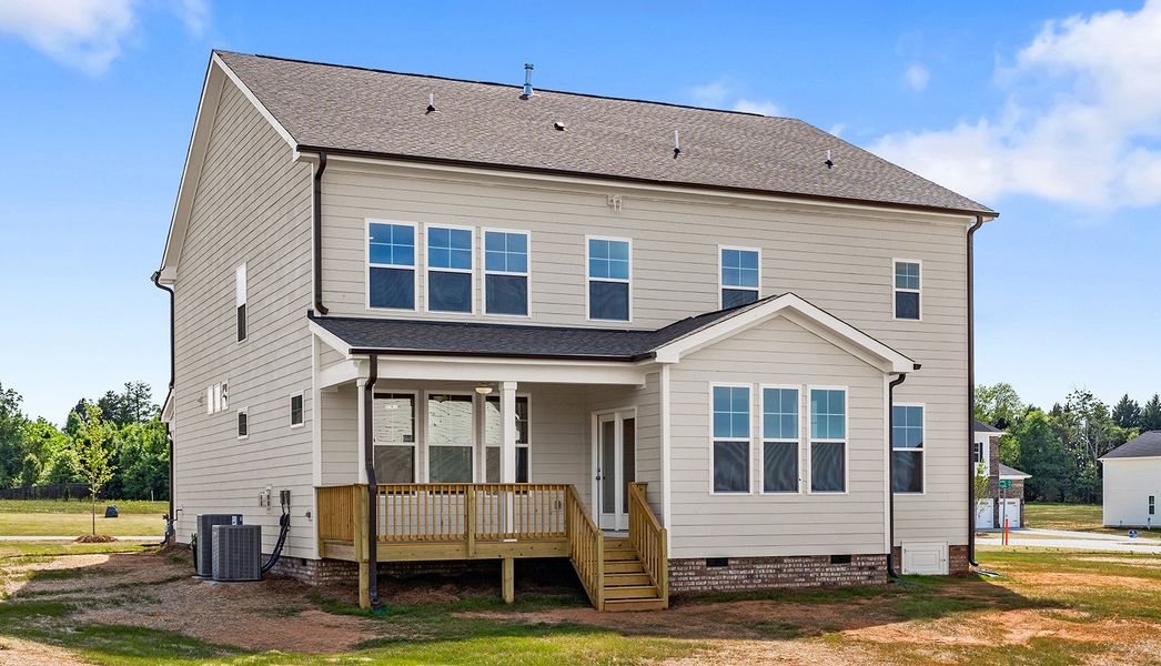 Exterior details and patio area of a home in Lilah Grove, Summerfield (Image 4).