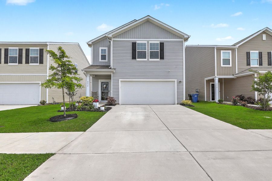 Front exterior of a new home in Watson Hill, Summerville, SC, highlighting curb appeal (Image 21).
