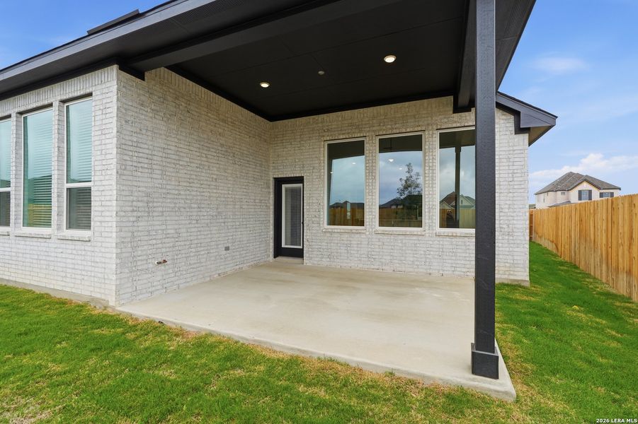 Exterior details and patio area of a home in Alsatian Oaks, Castroville (Image 3).