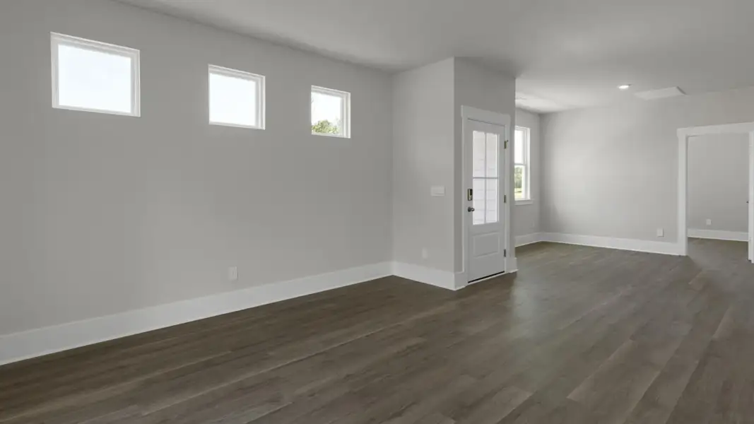 Spacious, unfurnished interior of a new home in The Retreat at Indigo Preserve Townhomes, Leland (Image 14).