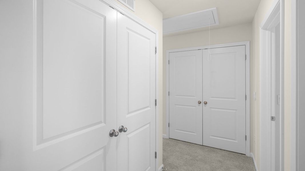 Representative unfurnished interior of a home built from the Pearson by D.R. Horton in The Townes at Ridgewood Farms, Winterville (Image 23).