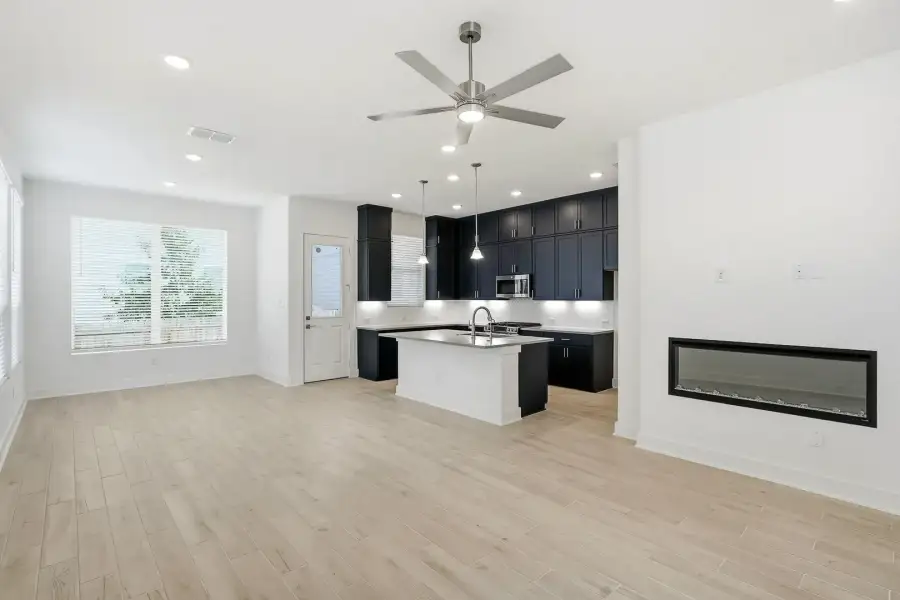 Furnished interior view inside a new home in Rose Hill, San Antonio (Image 5).