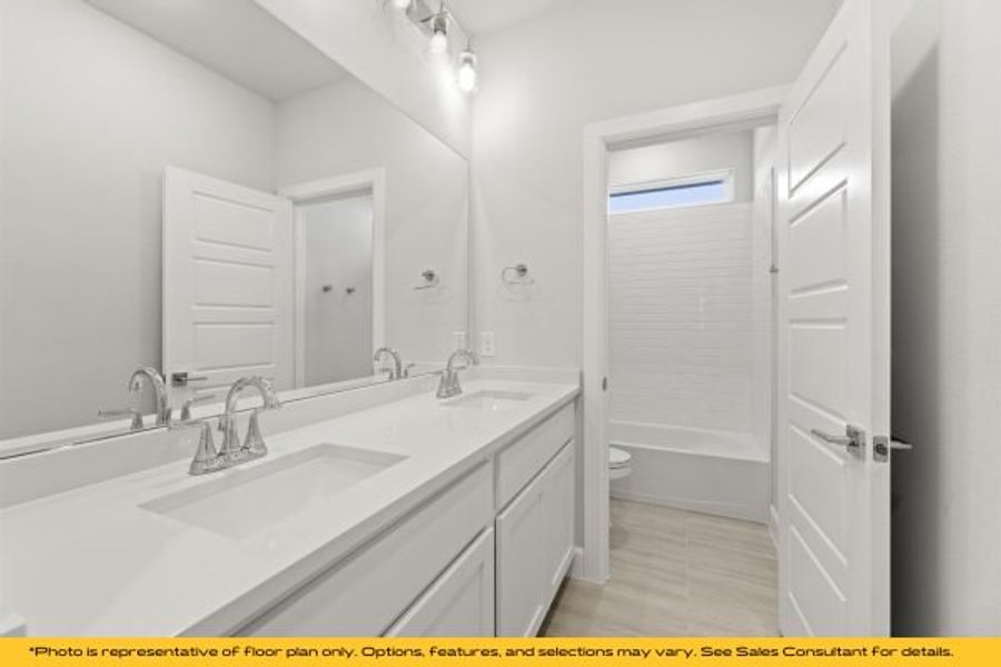 Representative furnished interior of a home built from the The Barbados by Stonefield Homes in The Highlands, Rockwall (Image 52).
