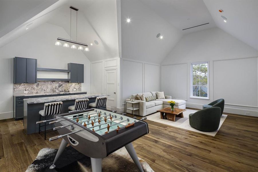 Game room with wet bar located adjacent to Media Room