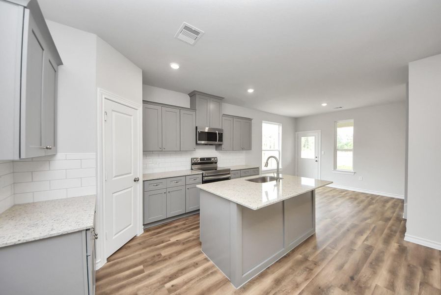 Furnished interior view inside a new home in The Enclave at Spring Branch, Conroe (Image 9).