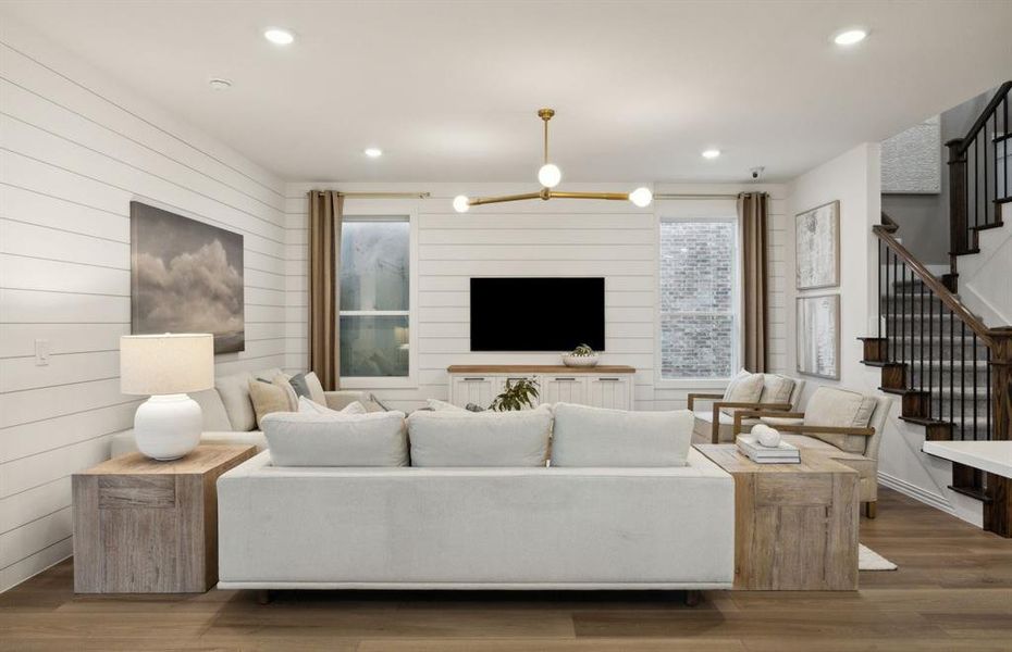 Open concept gathering room creating a spacious and inviting atmosphere *Model representation