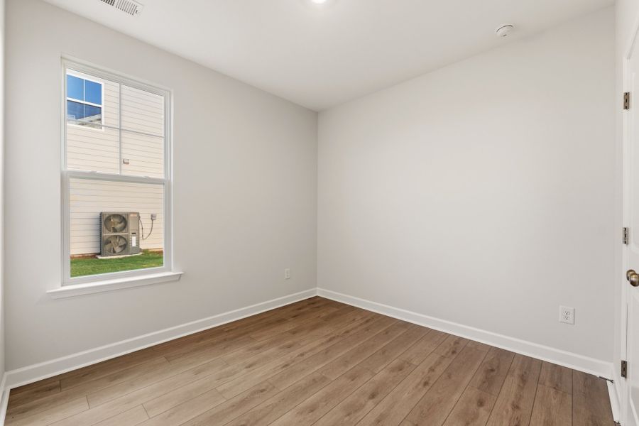 Spacious, unfurnished interior of a new home in Cottages at Lake Emory, Inman (Image 28). Spacious, unfurnished interior of a new home in Cottages at Lake Emory, Inman (Image 28).