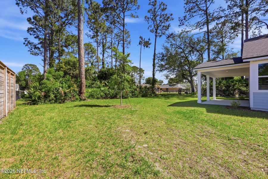 Exterior details and patio area of a home in Palm Coast Homes, Palm Coast (Image 31).