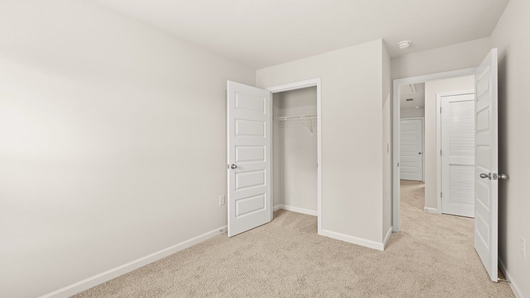 Spacious, unfurnished interior of a new home in Young's Crossing, Stone Mountain (Image 14).